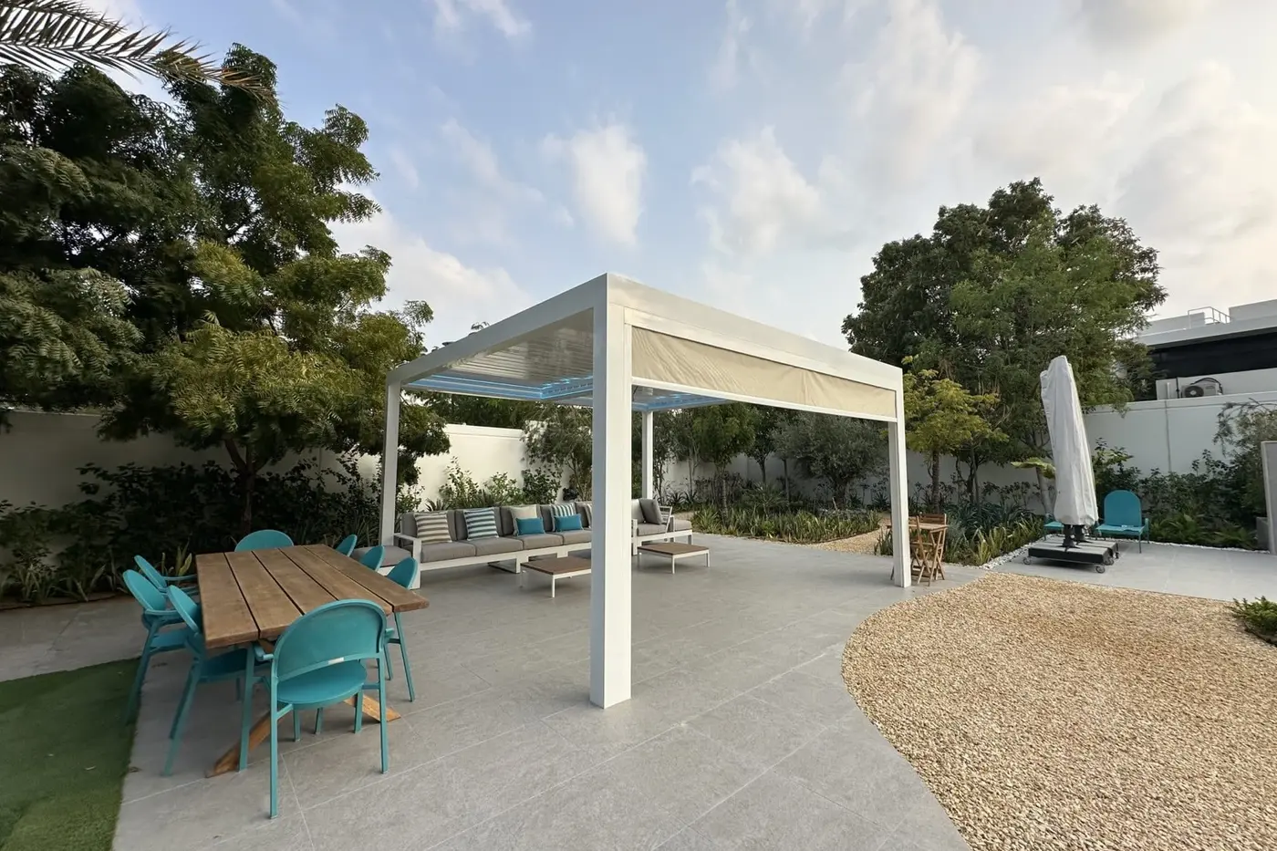 Sierra pergola with a zip screen in a villa garden on Saadiyat Island, Abu Dhabi
