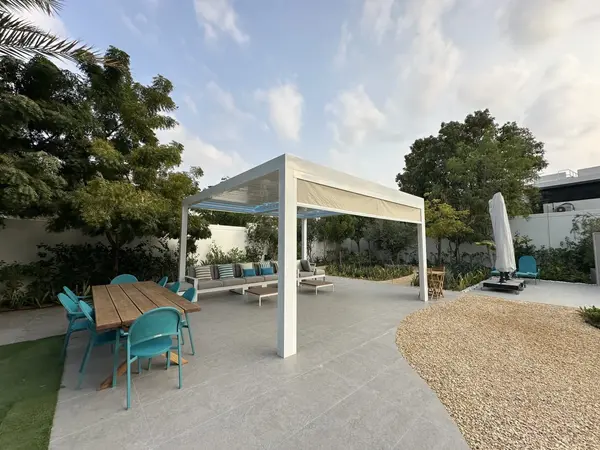 Sierra pergola with a zip screen in a villa garden on Saadiyat Island, Abu Dhabi
