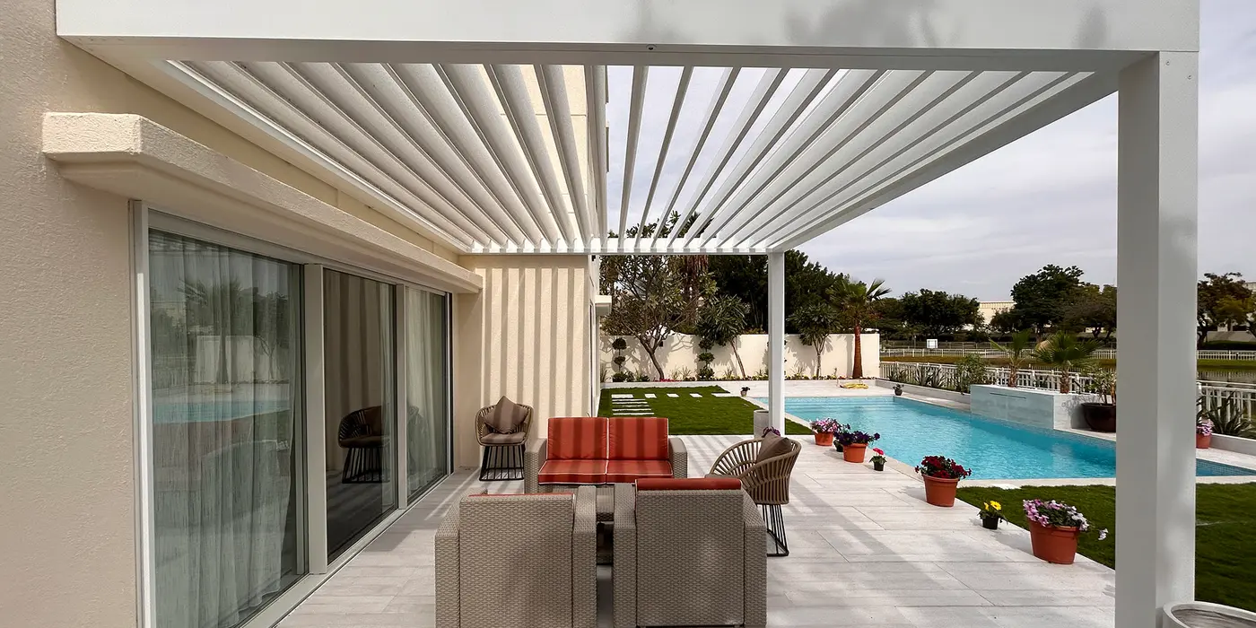 Bioclimatic pergola with open louvres over a terrace