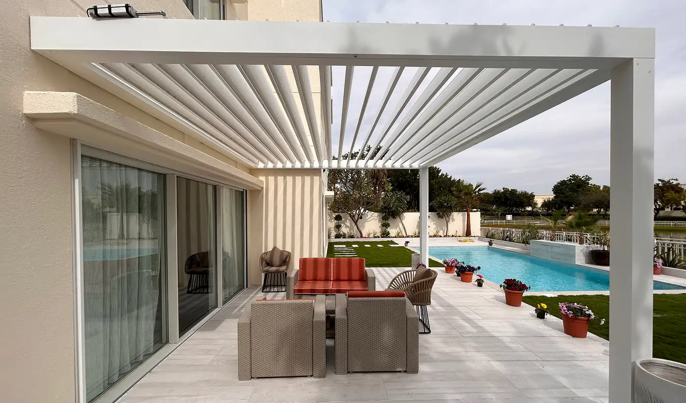 Bioclimatic pergola with open louvres over a terrace