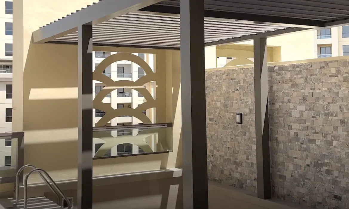 Pergola shading structure over an outdoor terrace