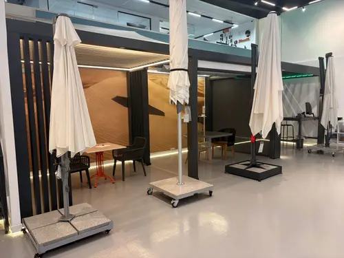 Inside the Shading Oasis Dubai showroom, with pergola and umbrella displays
