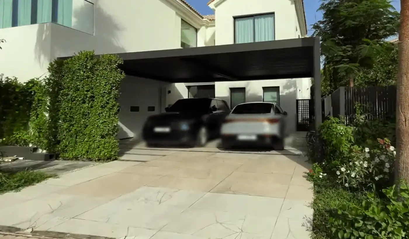 Anthracite Sierra pergola carport over a double driveway at a villa in Jumeirah Golf Estates