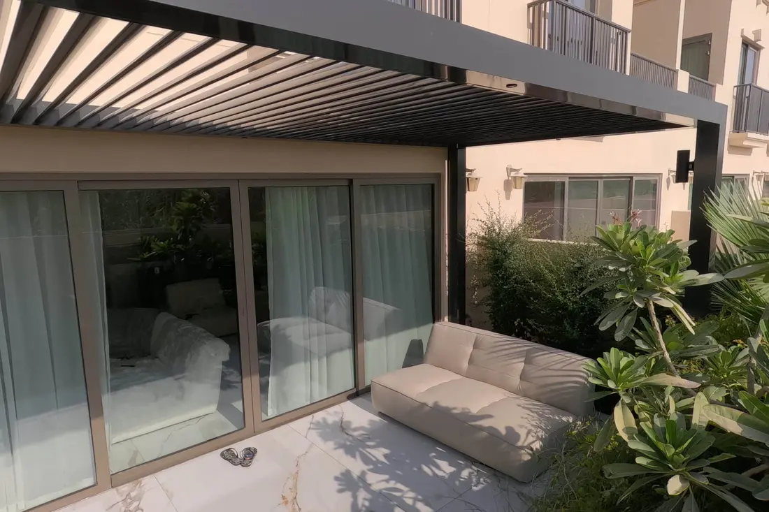 Liwa fixed roof pergola, wall mounted, at a villa in Jumeirah Golf Estates