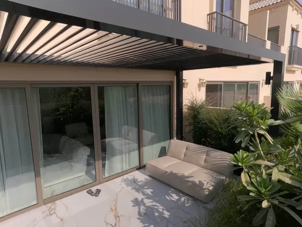 Liwa fixed roof pergola, wall mounted, at a villa in Jumeirah Golf Estates