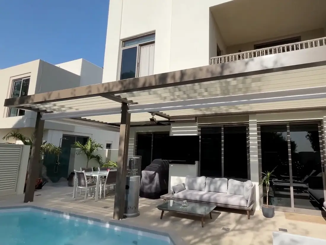 Sierra pergola over a pool terrace in Town Square, Dubai
